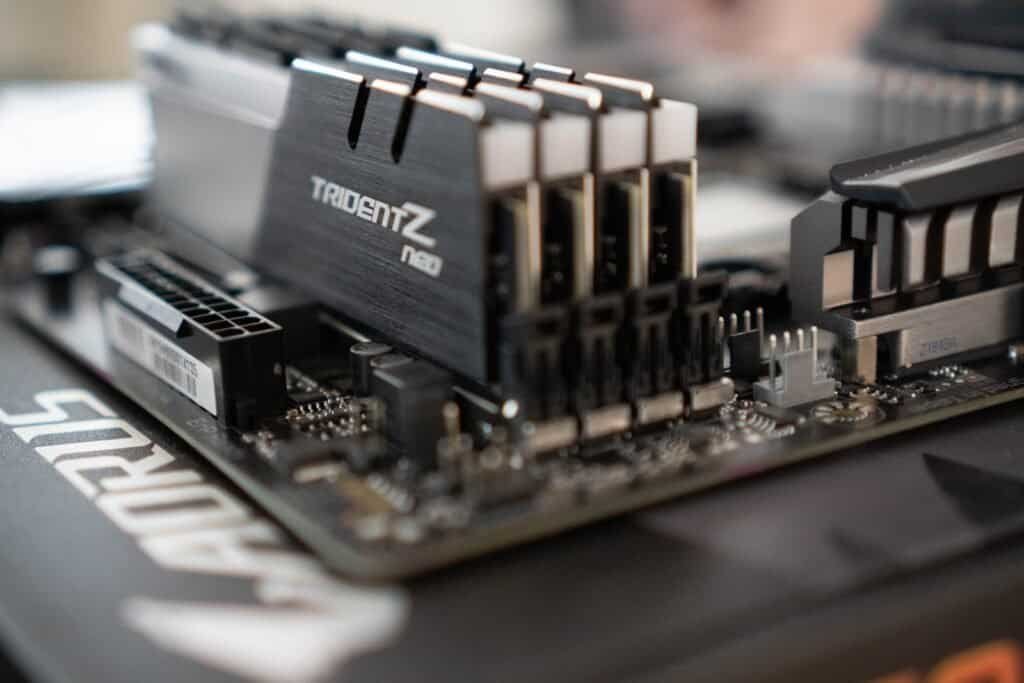 a close up of a computer motherboard with ram sticks on it.